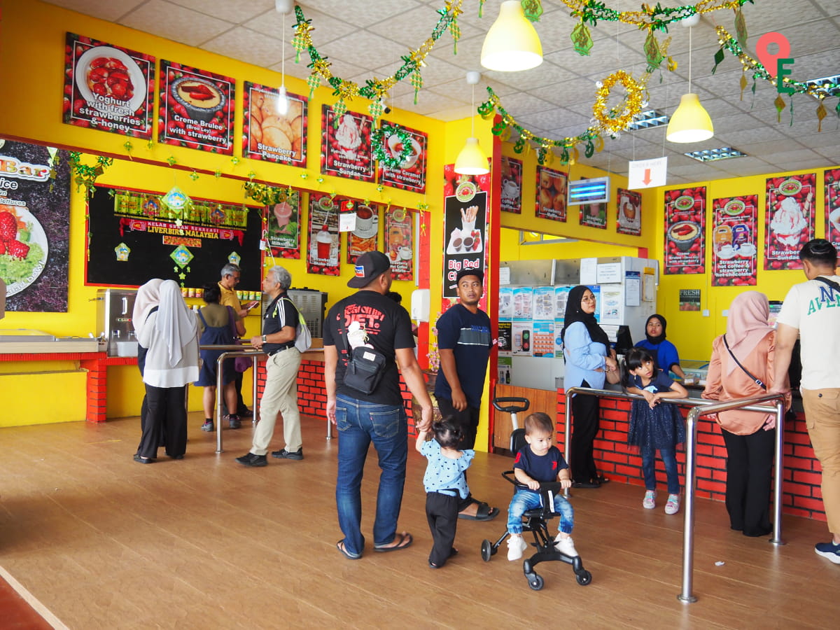 Visitors Placing Orders At The Counter At Big Red Strawberry Farm